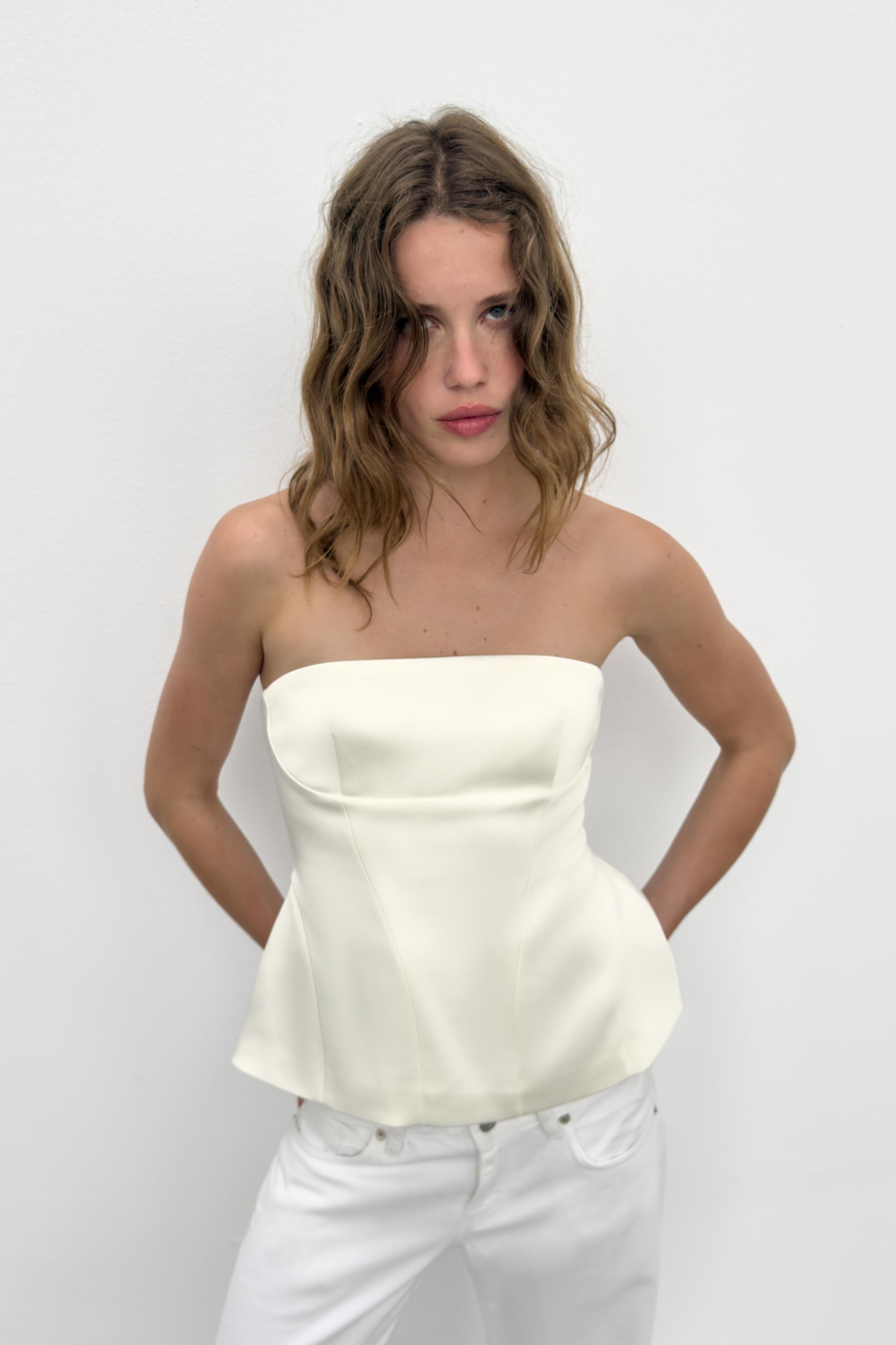 STRAPLESS PEPLUM TOP